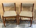 Pair of Wooden Chairs
. Chairs made of mahogany wood with back and seat upholstered in checkered Image - 1