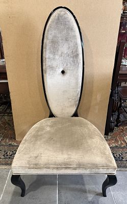 Christopher Guy's High Chair
. Oval-shaped elongated backrest, upholstered in taupe velvet 
