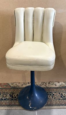 Mid-Century Modern Bar Chair
. Bar stool with leather upholstered seat and vertically ribbed 