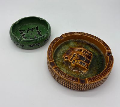 Two ceramic ashtrays. An advertising ashtray by J.C. Soares &amp; Filhos Lda. - Guimar&atilde;es with 