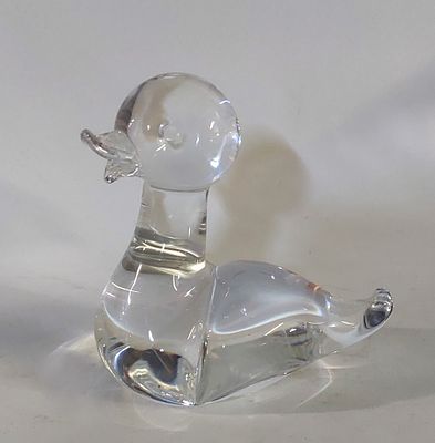 Glass Paper Weights
. Glass body representing a duck with a simple and fluid design, featuring a 
