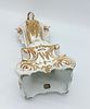 Sculpture in Porcelain. Representing Saint Mary, gold decoration on a white background supported Image - 7