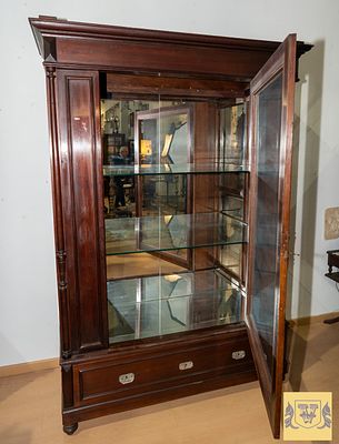 Wooden Showcase/Cabinet. Mahogany, with a glazed front door, glass sides with two glass shelves 