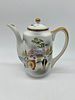 Oriental Porcelain Coffee Service
. Molded and relief, marked on the base, teapot and ten cups Image - 8