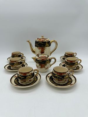 Oriental Porcelain Coffee Service
. Molded and relief, marked on the base, teapot, sugar bowl 
