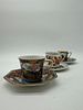 Three Coffee Cups in Oriental Porcelain
. Molded and relief, marked on the base, bodies of Image - 1