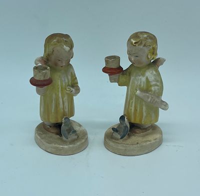 Two Portuguese faience sculptures 
. Two Portuguese faience sculptures depicting angels standing 