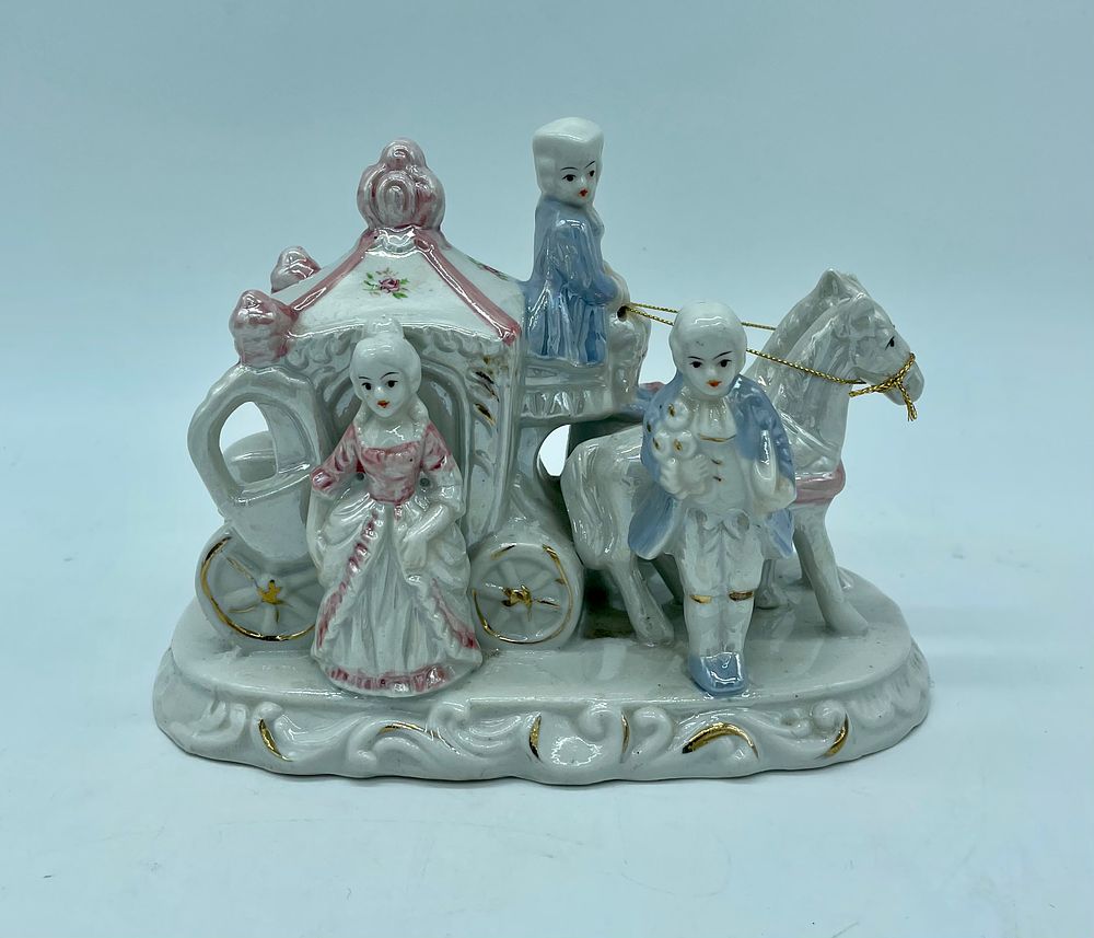 Porcelain sculpture. Moulded and relief porcelain sculpture depicting young people in a 