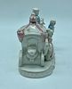 Porcelain sculpture. Moulded and relief porcelain sculpture depicting young people in a Image - 3