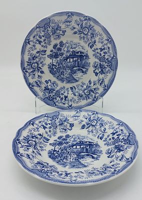 Two Deep Dishes in Italian Earthenware
. Marked on the base, Ironstone Tableware, blue edged rim 