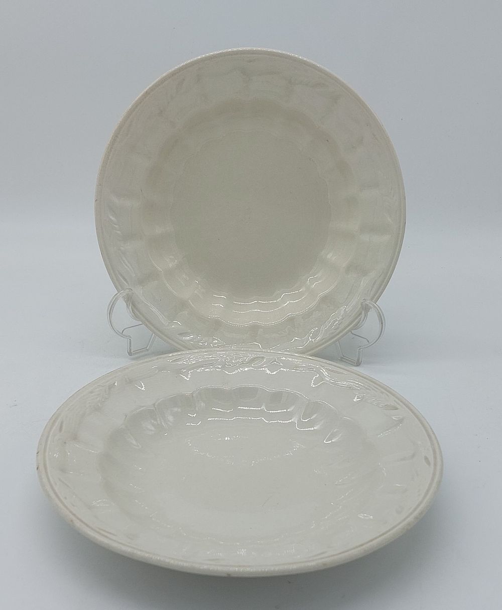 Two Deep Dishes in Portuguese Earthenware
. Marked on the base, Sacav&eacute;m, with raised and 