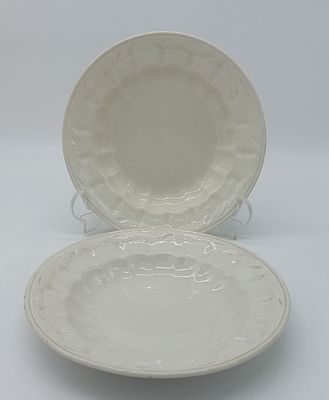 Two Deep Dishes in Portuguese Earthenware
. Marked on the base, Sacav&eacute;m, with raised and 