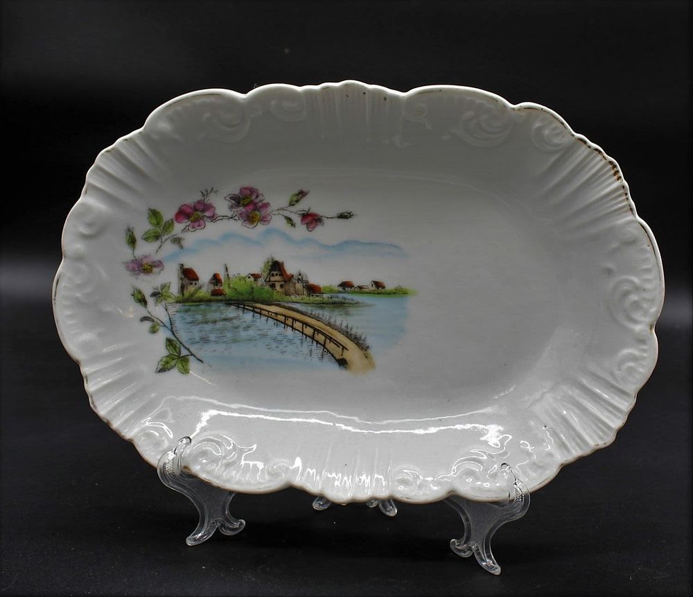Porcelain platter. Molded and relieved from the Vista Alegre factory, marked on the base, mark 