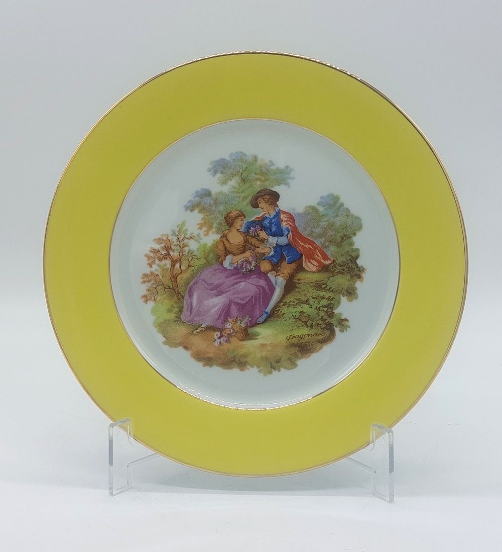 Portuguese Porcelain Plate
. Molded and embossed, marked "Spal" on the base, with a gold-trimmed 