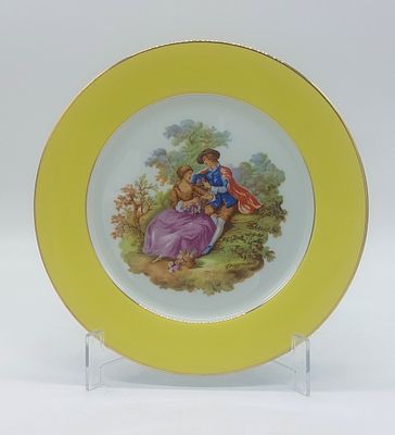 Portuguese Porcelain Plate
. Molded and embossed, marked "Spal" on the base, with a gold-trimmed 