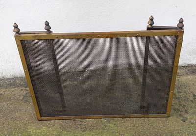 Metal Fireplace Fronts
. Rectangular body in gold-plated brass with two hinged side panels that 