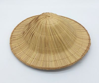 Bamboo Hat
. Round body made of bamboo strips, handcrafted, with slight signs of use, as shown 