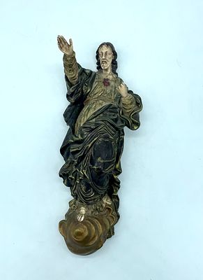 Religious wall ornament. Figure of Jesus Christ in ivory, with metal appliqu&eacute; for hanging on the 