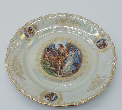 German Porcelain Plate
. Marked on the base C F C Bavaria, wavy edge edged in gold with gold and 