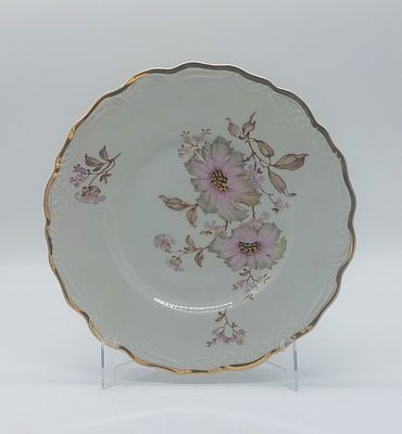Portuguese Porcelain Plate
. Molded and embossed, marked "Artibus" on the base, wavy edge with 
