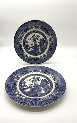 Two English Earthenware Plates. Pair of English earthenware plates, featuring blue decoration on 