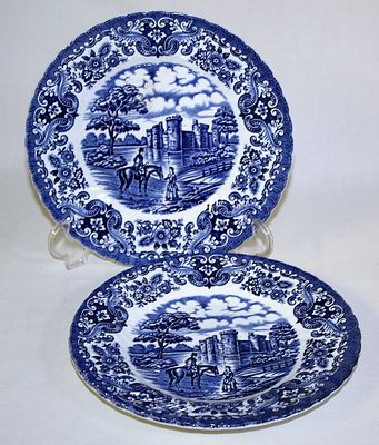 Pair of English Faience Plates
. Pair of English Ironstone porcelain plates featuring a 