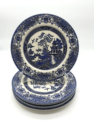 Six English Faience Soup Plates
. Round-bodied vessels, marked on the base, featuring blue 