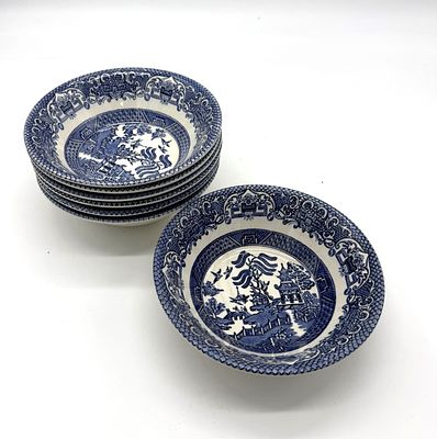 Set of Seven English Earthenware Bowls
. Round-bodied pieces with blue decoration on a glazed 