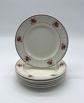 Six Portuguese Faience Plates
. Round-bodied pieces with the Sacav&eacute;m mark on the base 
