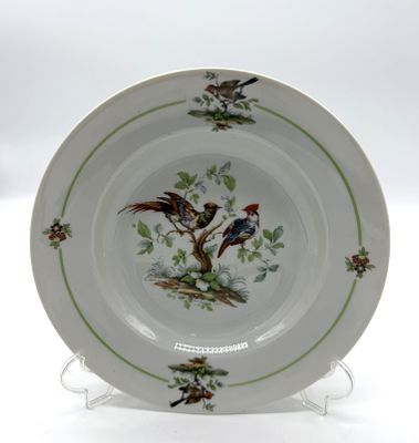 Portuguese Porcelain Deep Plate
. Molded and relief-decorated, with a mark on the base reading 