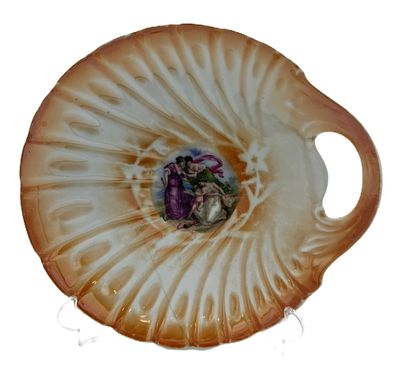 Czechoslovakian Porcelain Platter
. Molded and relief-decorated, marked "RFH" on the base; 