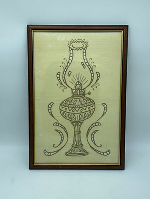 Embroidery frame. Frame with embroidery on canvas depicting floral motifs. Wooden plaque frame 