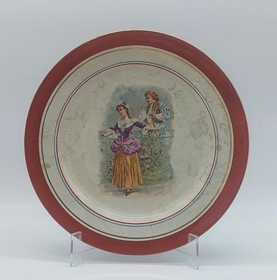 European Earthenware Plate
. Unmarked at the base, edge trimmed with polychrome fillets and 