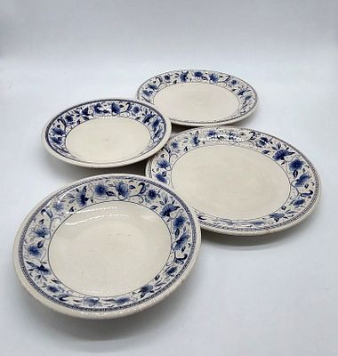 Four Earthenware Plates
. Marked on the base, two soup plates and two side plates, with blue 