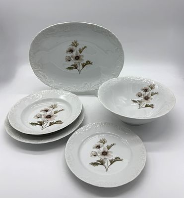 Part of a Portuguese Porcelain Dinner Service
. Molded and embossed, marked on the base, SPAL 