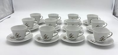 Twelve coffee cups in Portuguese porcelain
. Molded and embossed, marked on the base, Spal 