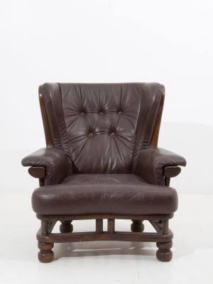 Poltrona in legno e pelle. Anni '80.