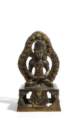 Buddha con raggiera in bronzo. 20x12x9.5 cm ca. Scultura in bronzo con tracce di doratura e 