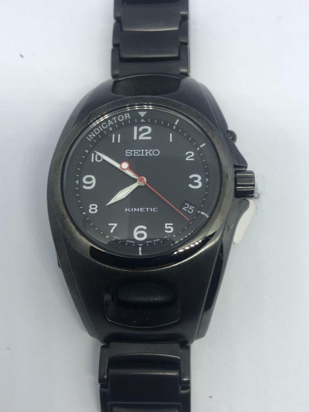 Watch: Seiko 
Model: Kinetic 
. Case: Browned steel 
Movement: 