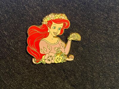 Ariel Holding Flowers Pin