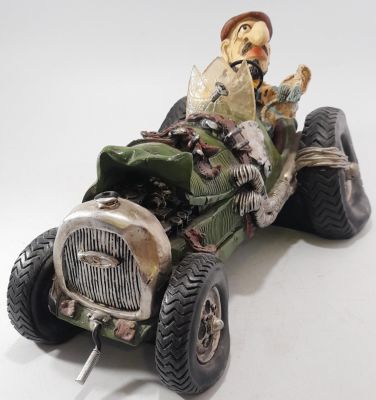 COMICAL CAR MONEY BOX IN VGC - LENGTH 12 INCHES