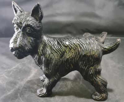 CAST IRON WEEING TERRIER DOG 8 X 7 INCHES