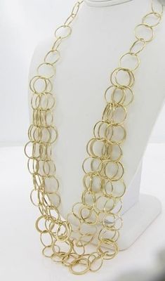 14K Yellow Gold Fashion Layered Wire Necklace. A 14K yellow gold, round open wire circle link 