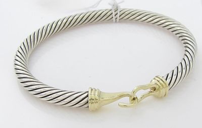 David Yurman 18K/Sterling Buckle Bracelet. A David Yurman sterling silver, 5mm wide, cable style 