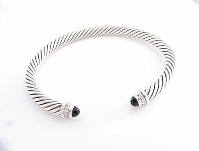 David Yurman Onyx Diamond Cuff Bracelet. A David Yurman 5mm wide cuff bracelet with onyx ends 