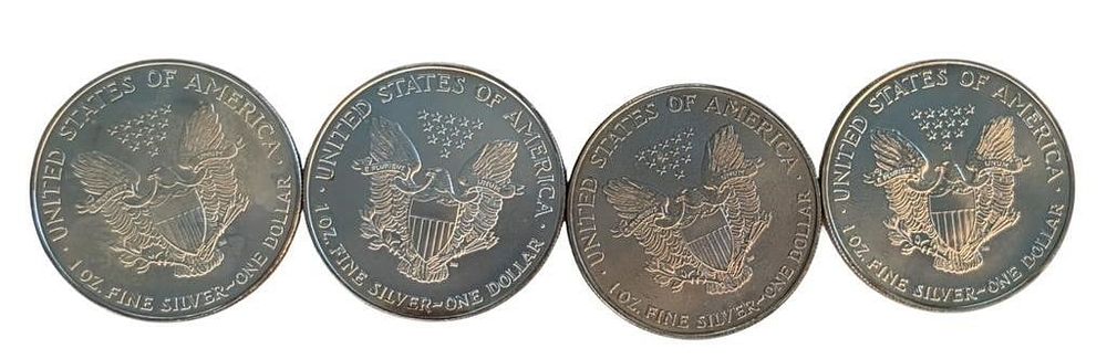 Lot 1805: (4) US Silver Eagle .999 Silver Coins