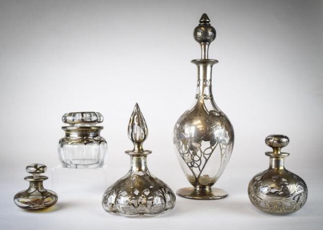 Lot 259: Grouping of Silver Overlay Bottles & Jar