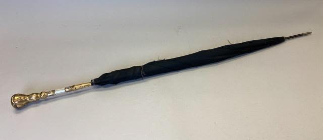 Lot 596: Umbrella with Gilt Pommel Handle