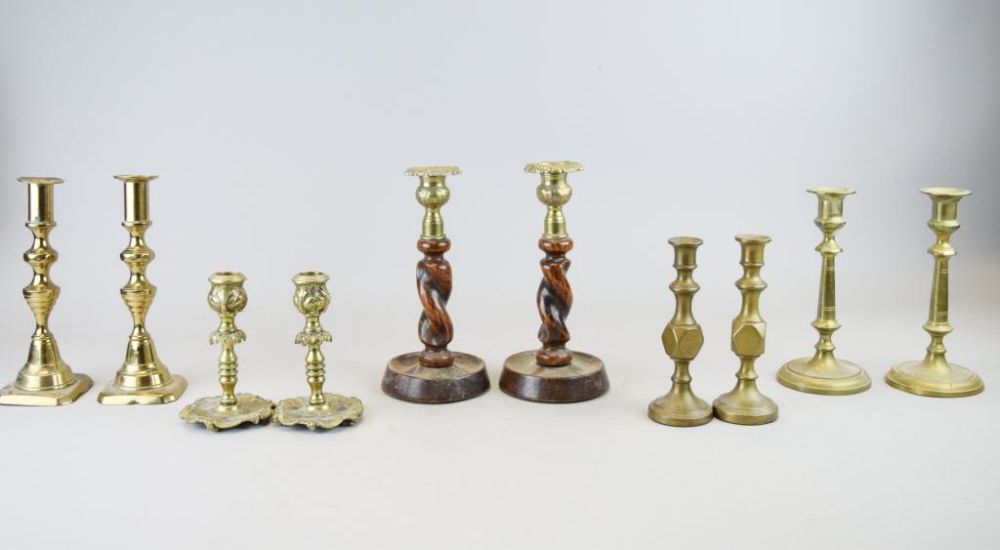 Lot 260: Grouping of Brass Candlesticks