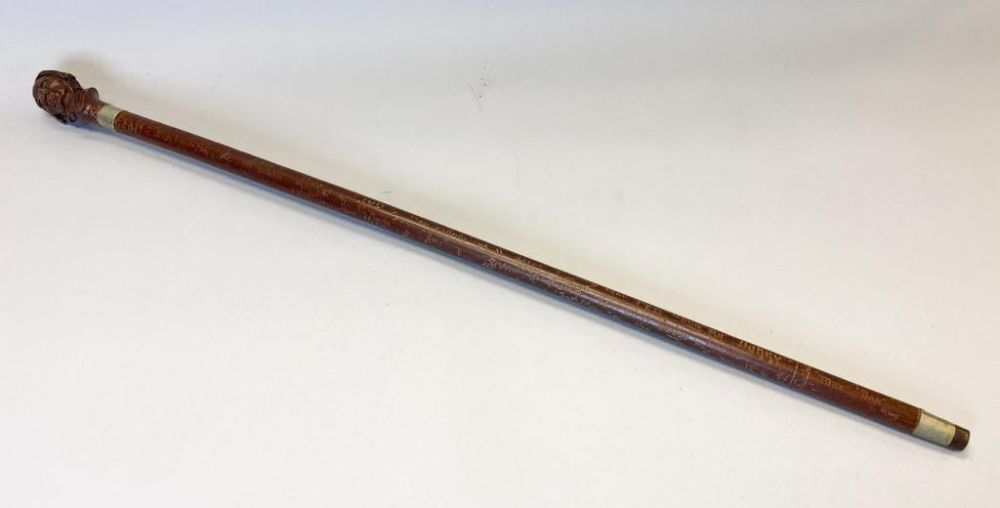 Lot 212: Carved Wooden Cane with Native American Head